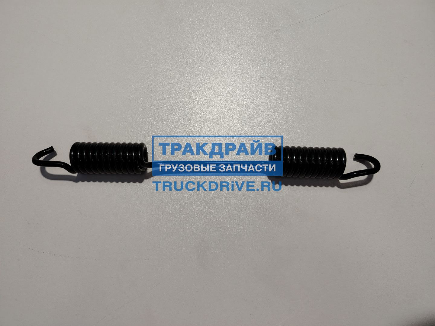 Фото AVLKRAFT 70310804 пружина стяжная колодок грузовиков MAN Mercedes 4x26x235 мм