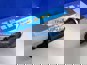 Фото CNHTC 712W4172260321 амортизатор кабины задний пневмо для HOWO T5G и SITRAK C7H (неоригинал) 1