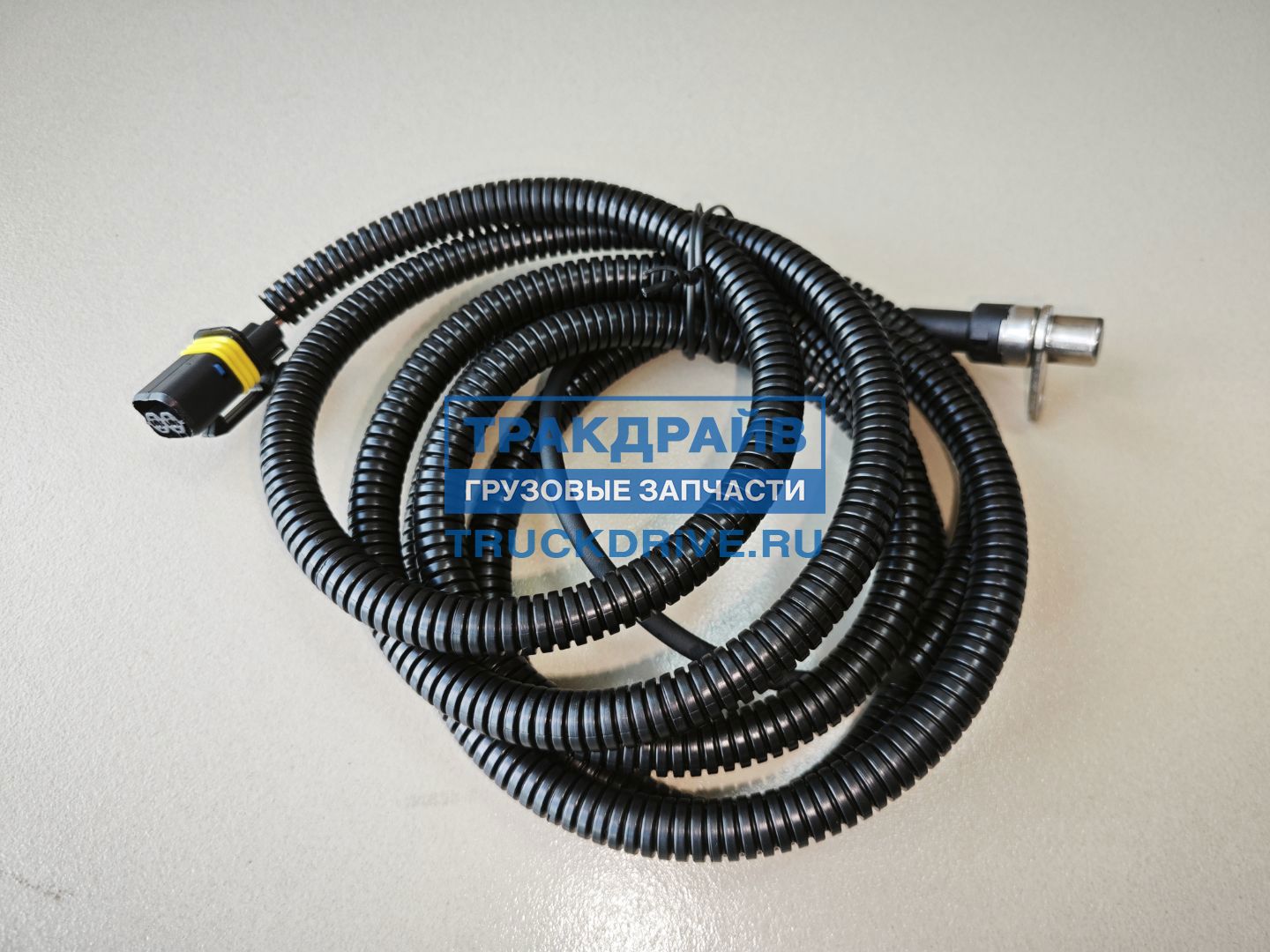 Фото EXOVO 04000E датчик числа оборотов ABS задний правый для Ман Тга Тгс Тгх L=2160 мм