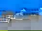 Фото FAW 28030822000DQ8 правая боковая отделочная панель переднего бампера для FAW J7 1
