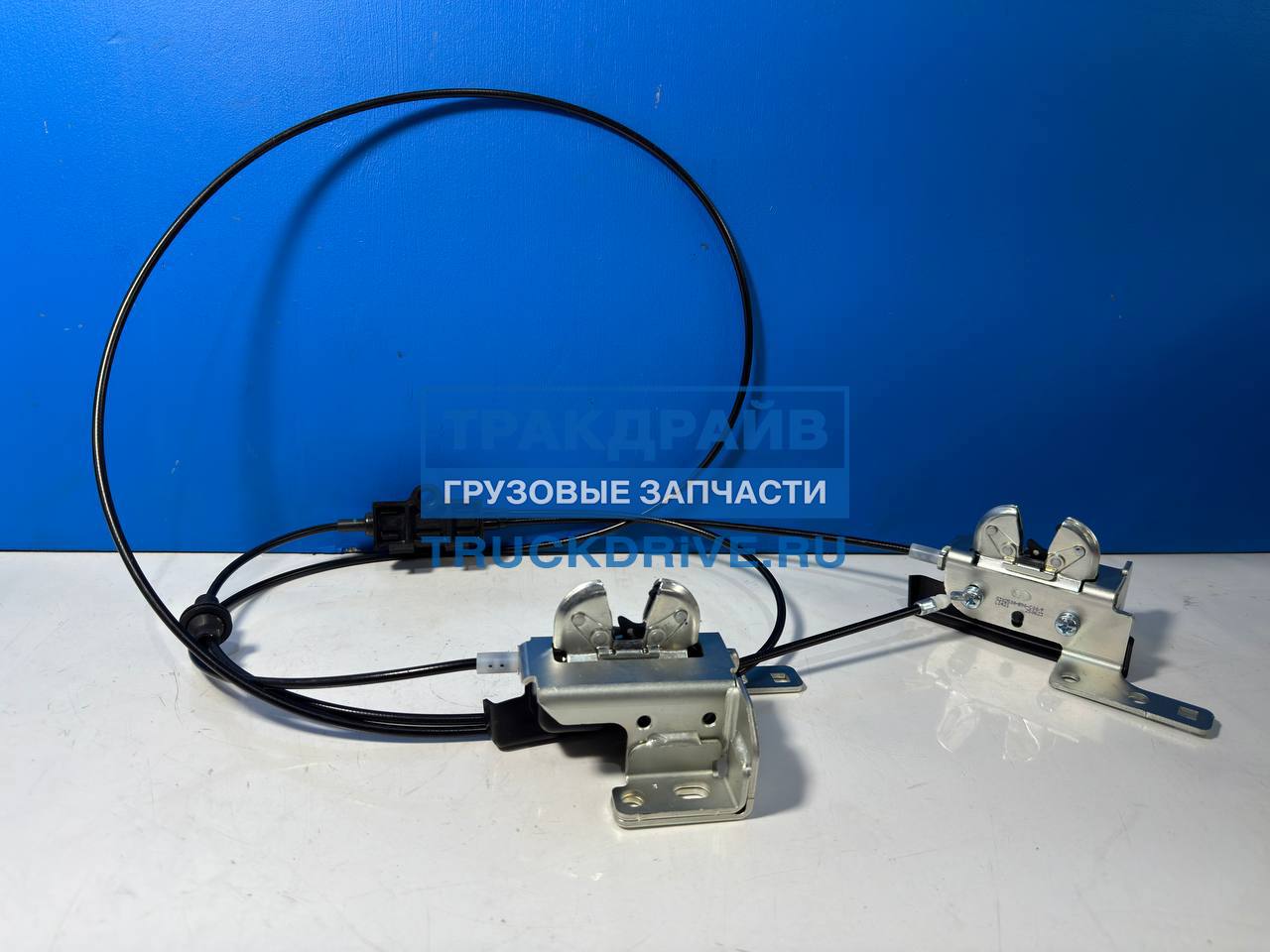 Фото FAW 5302500B90C00F замок капота с тросом для Фав J7 в сборе