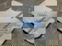 Фото FAW 5704211B90GMT дефлектор Фав J7 сзади кабины верхний левый белый цвет