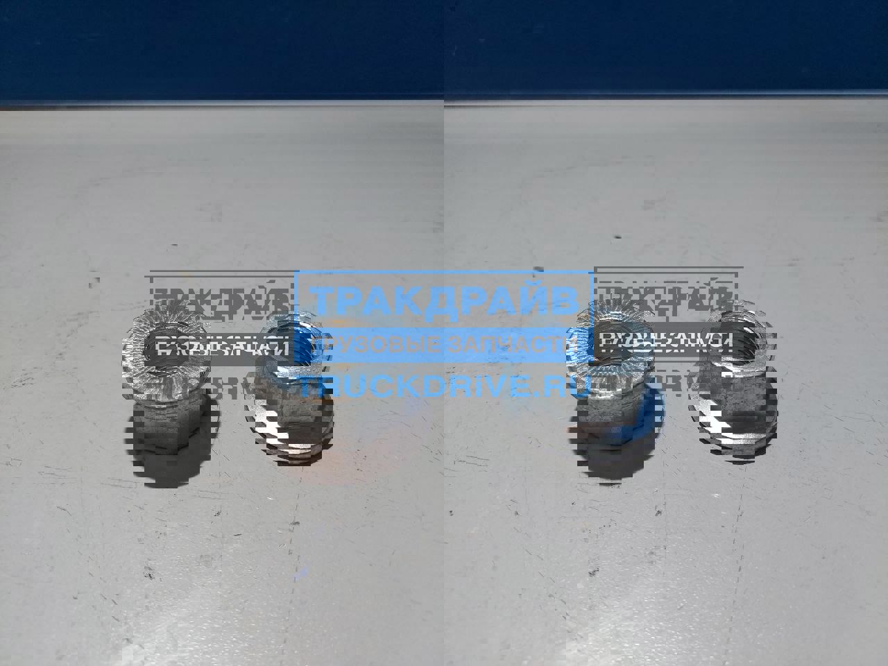 Фото KAMAZ 35675041 гайка М20х1,5 (высокая с "юбкой")