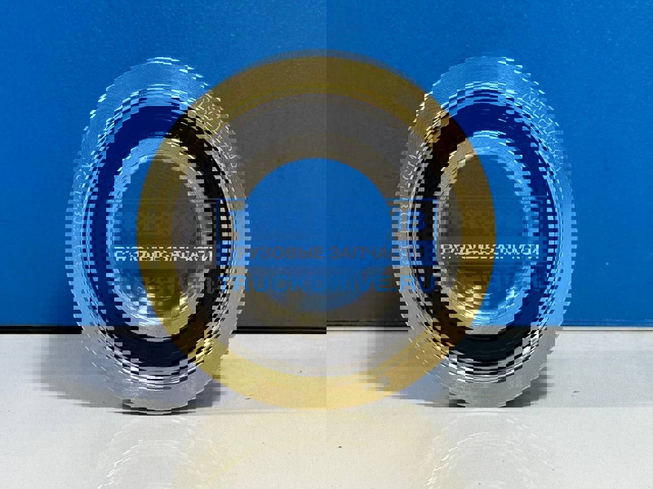 Фото МАЗ 6501308111 ролик промежуточный с подшипником в сборе ЯМЗ-650