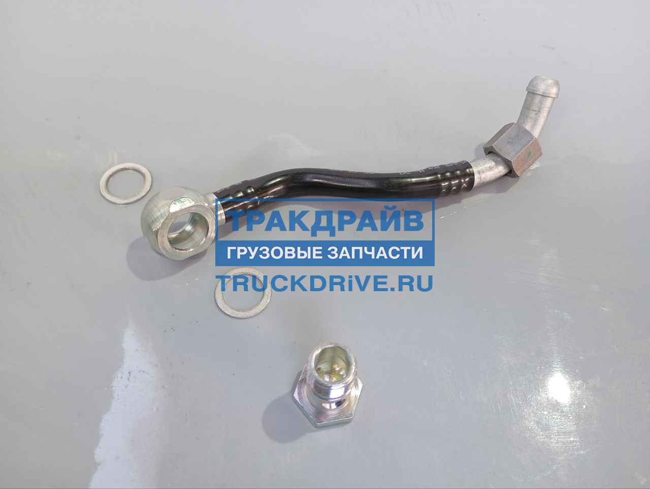 Фото MERCEDES-BENZ A4572005052 трубка компрессора водяного охлаждения болт-фланец Mercedes Axor 6