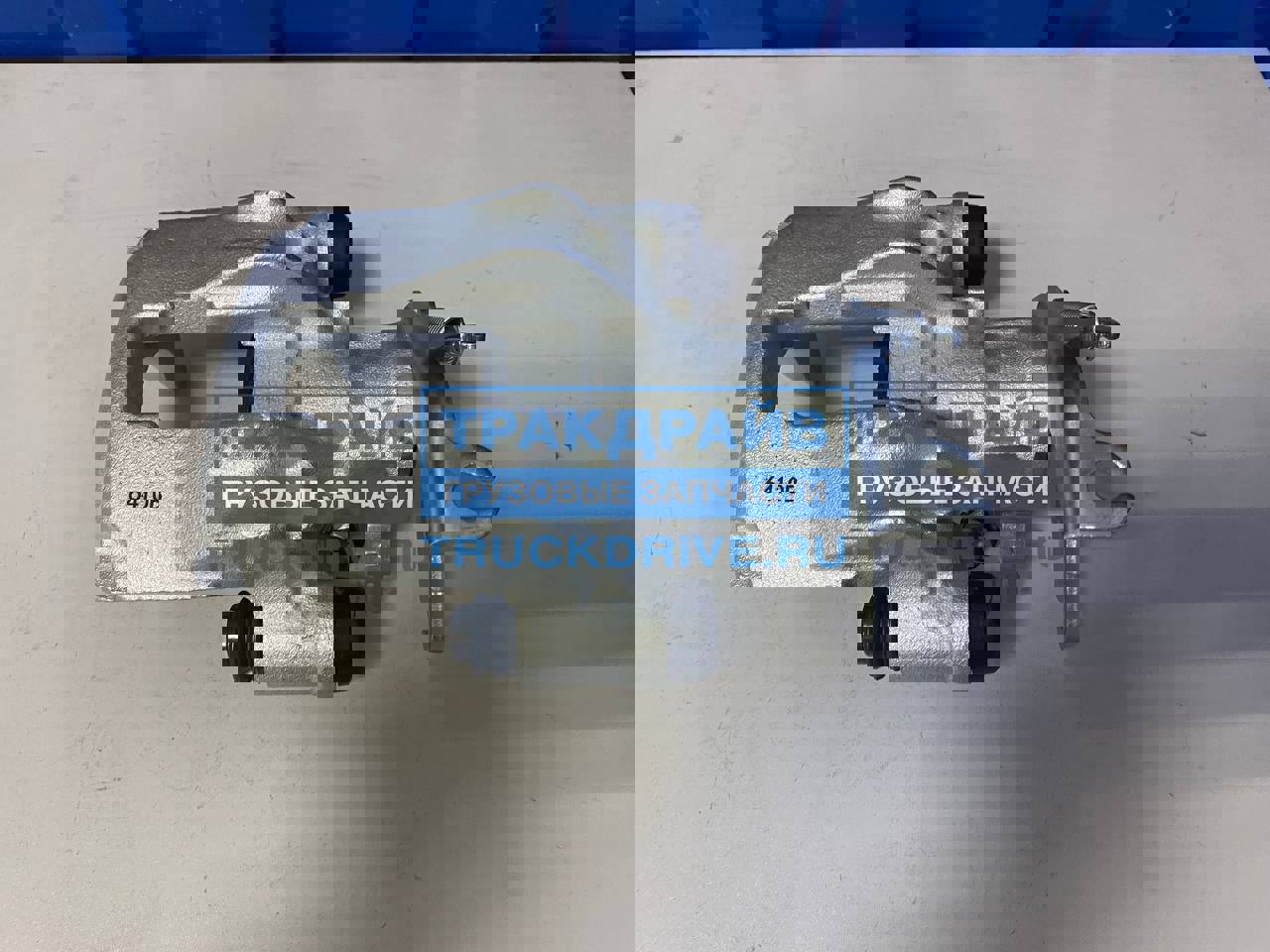 Фото NK 212377 суппорт тормозной Ивеко Дейли передний левый 2