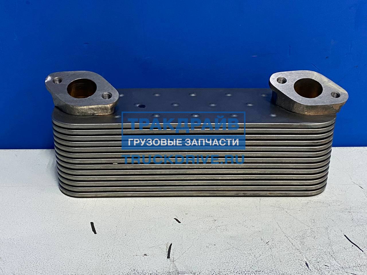 Фото NRF 31049 радиатор масляный Мерседес Аксор двигатель OM441 OM442