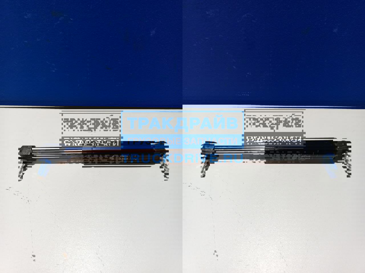 Фото РОССИЯ СК0330210613 пневмопружина 300N с пальцами шарнира для НЕФАЗ 5299 в сборе