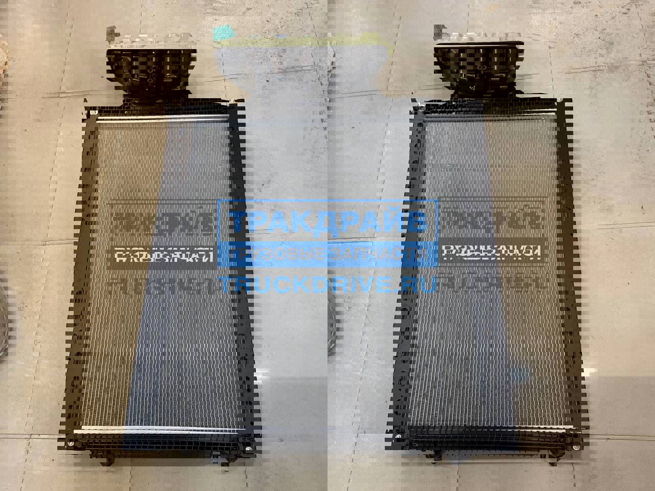 Фото SIMPECO SP90013011 радиатор с рамкой МАН ТГА ТГС ТГХ 920*938*40 мм. аналог 81061016512