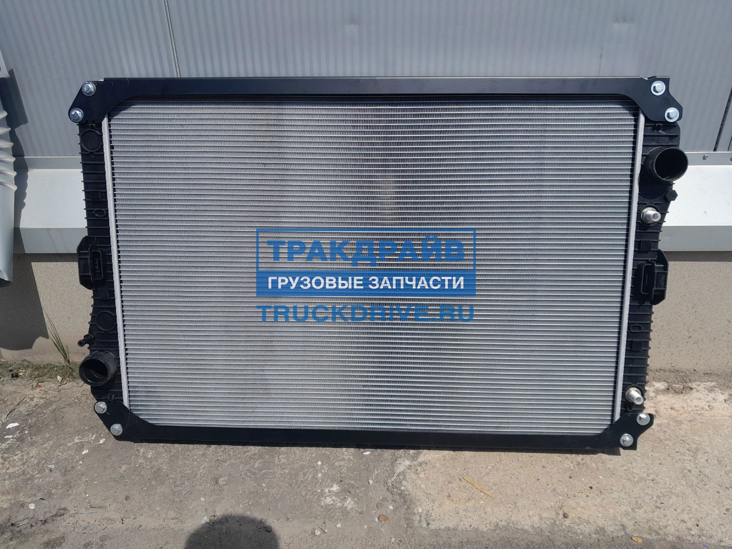 Фото SIMPECO SP90014021 радиатор с рамкой для Мерседес Аксор 975х668х40 мм