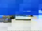 Фото SITRAK WG9731680031 амортизатор второй оси передней позвески Howo 8x4