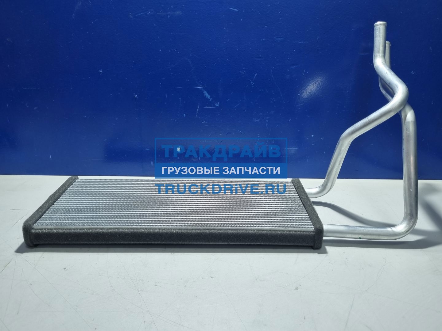 Фото SONDER 130010146 радиатор основного отопителя кабины для SITRAK C7H HOWO T5G