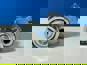 Фото TE PARTS 51112530 натяжитель ремня Mercedes Axor металлическая обойма ролика