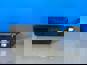 Фото ТЕХАВТОСВЕТ U02704L фонарь универсальный задний левый 24В тонированный поворот с АМР разъёмом 1