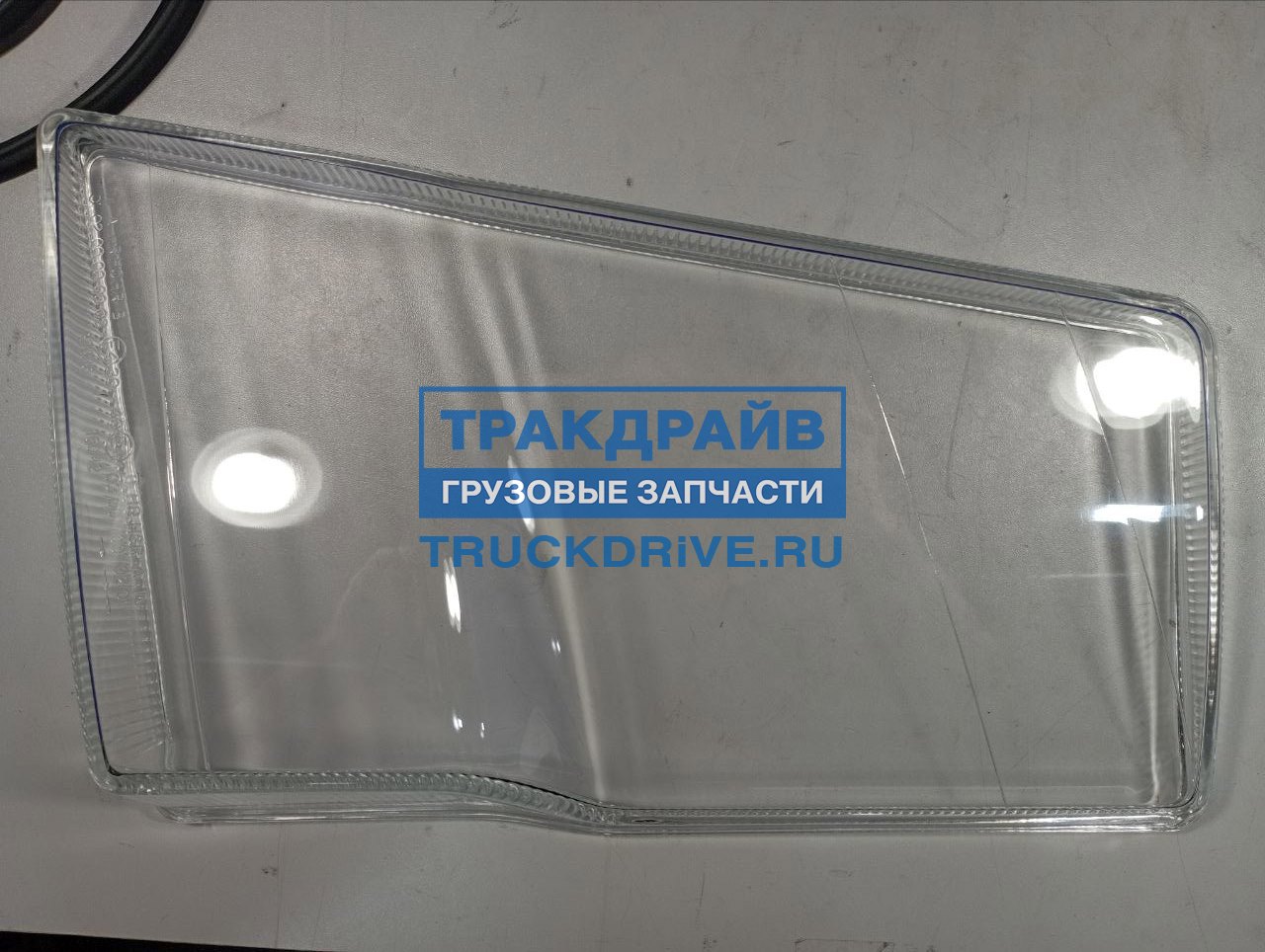 Фото TOPCOVER T10927003 стекло фары левой Вольво FH 12 (2000-2008) T1092-7003 и TD01-51-001LSR - с у