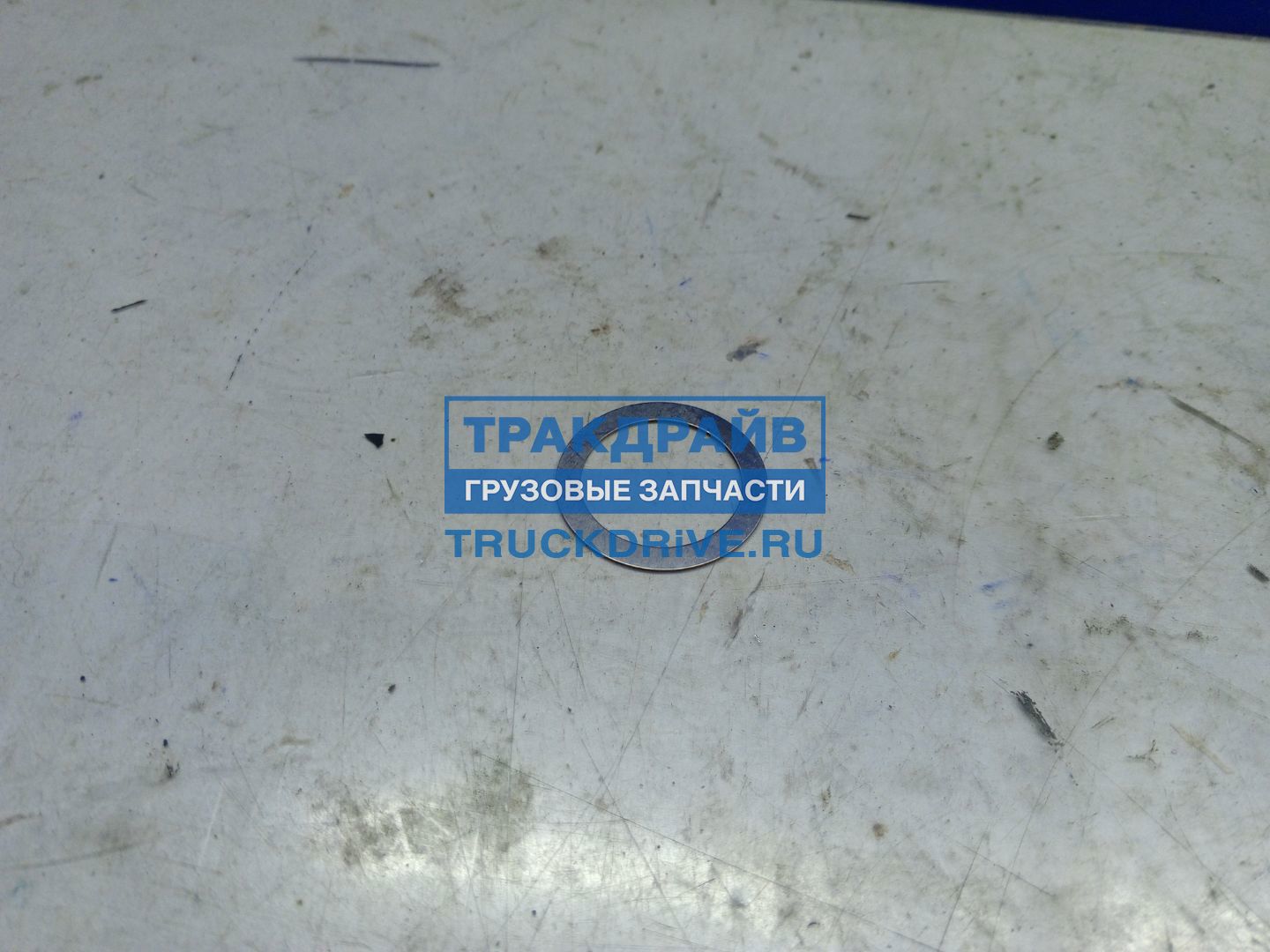 Фото TRUCKTEC 0112070 шайба пружины клапана регулировочная Mercedes MAN 0,5 мм