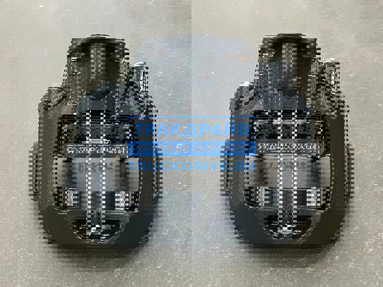 Фото TTT 52046 суппорт Wabco Maxx22 прицепа Schmitz левый без колодок